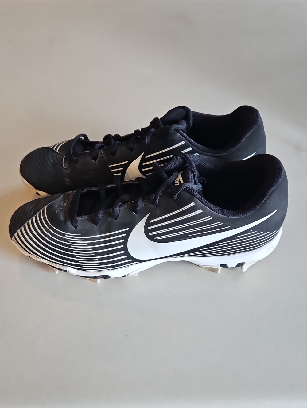Nike Black and White Softball Cleats with Stripe Detail